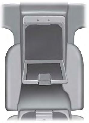 Seats E152622 Release the latch, then pull down on the door located in the back
