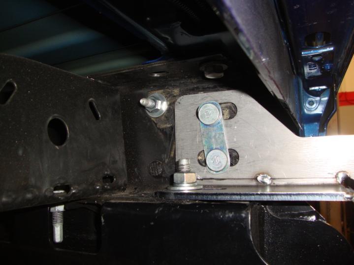 The bezel mounting plate will seem like it is stuck on, but continue pressing for at least 30 seconds.