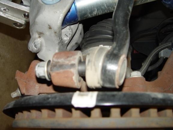 Remove the 5/8" Inner Rod End Bolt and swing the tie rod