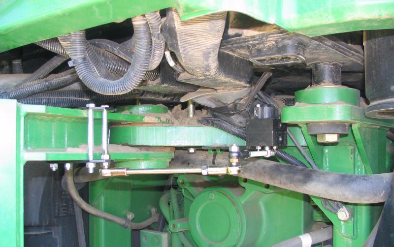 When the wheels are turned, the linkage bracket should move relative to the angle sensor bracket. The linkage arm and rod rotate the angle sensor when the wheels are turned.
