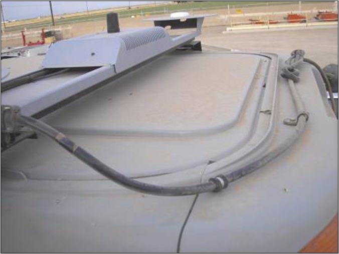 Roof Module Installation Tasks Route the main harness towards the back of the cab roof and secure using a cable clamp on existing roof screw.