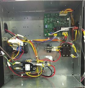 Connect the green wire from the wiring harness to an appropriate ground lug on the unit. (ee Fig. 10) d. Connect the yellow (24VAC) and black wires (common) to the compressor contactor coil. e.