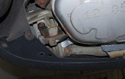 REMOVING THE STOCK CAT-BACK Step 3: Exhaust Pipe Hanger Remover Pliers Support the exhaust from below, then