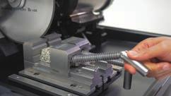 Lateral adjustment enables precise vise positioning for precision sectioning applications.