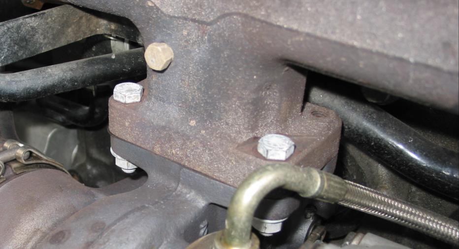 These bolts should be inserted from the manifold side and fastened to the turbine housing using the supplied washers and nuts.