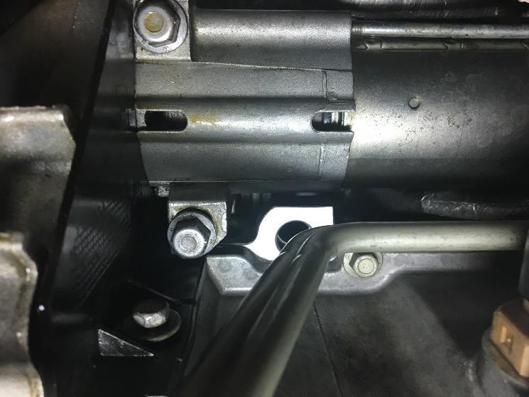 Remove header bolts, 6 on each side, with ½ ratchet wrench.