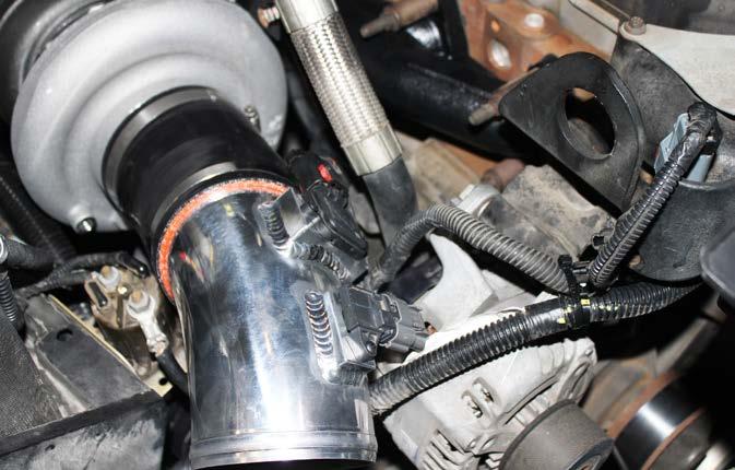 STEP 22 Using the supplied 4 worm-gear clamps, Install the supplied 20-degree 4 intake boot on the turbocharger compressor housing inlet and