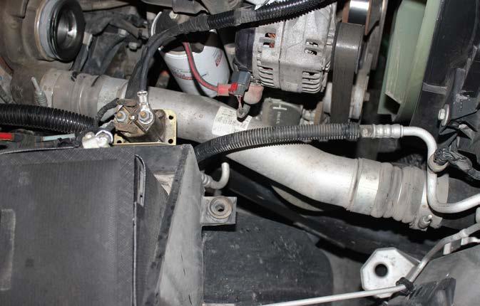 STEP 4 Disconnect and remove the factory exhaust crossover tube and remove the exhaust valve from the