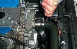 Remove the accessory serpentine belt by rotating the