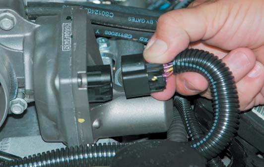 93. Remove the tape and split loom from the harness to about 6 below the Electric Throttle Control (ETC) connector.