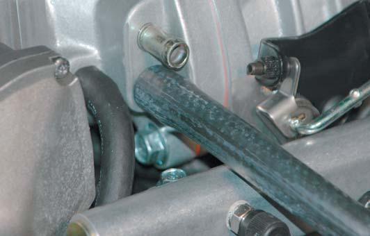 Assemble the PCV outlet hose by cutting a 18 length of the 3/8 hose.
