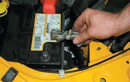 1. Open the hood and remove the under hood insulation by prying out the seven plastic buttons that