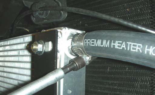 Using the last of the remaining ¾ hose, attach one end to the outlet barb on to the intercooler