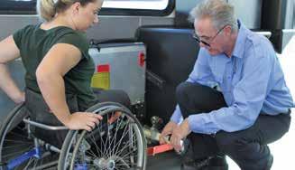 Once your mobility device is secured, you may move to a seat if you so choose. For your additional safety, we encourage you to use the shoulder strap and lap belt.