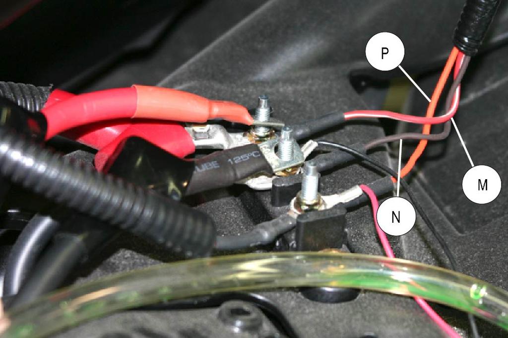 10.Locate the positive, negative and keyed power ring terminals on the EPS harness and route this end of the harness through the under-hood splash tray.