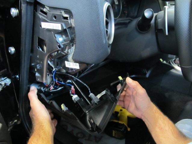 Remove the switch panel for the trunk release.