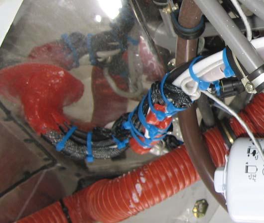 Title: ADF System Improvements Page: 11 of 16 Remove the high temperature sealant Figure 9 10.3.1.9 Route the ground cable through the nylon spacer into the nacelle compartment. 10.3.1.10 Remove the access panel located on outboard of the nacelle.