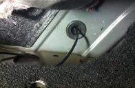 38. Seat grommet affixed to the supplied Chassis Harness in the body floor plug hole by firmly pressing it