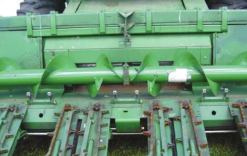 Cross Auger Flighting- Cross auger should be vertically adjusted to have 1 ¾ clearance between auger fl ighting and tray at the tightest point.