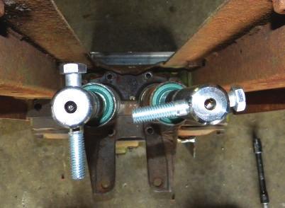 (place bolts in each roll pin hole to see more clearly) CORRECT NOT CORRECT If the timing is not correct; loosen housing