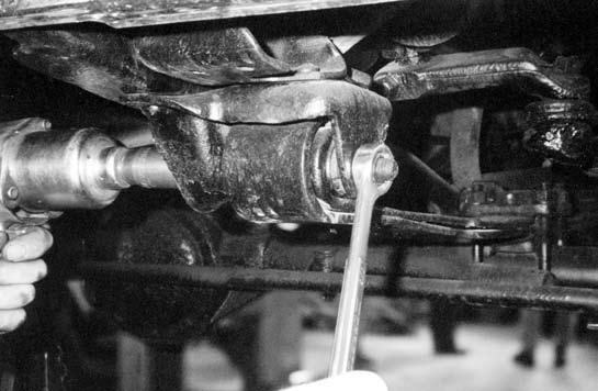 Refill the master cylinder with Dot approved fluid.. Place hydraulic floor jack under front differential and rise to support differential. 5.