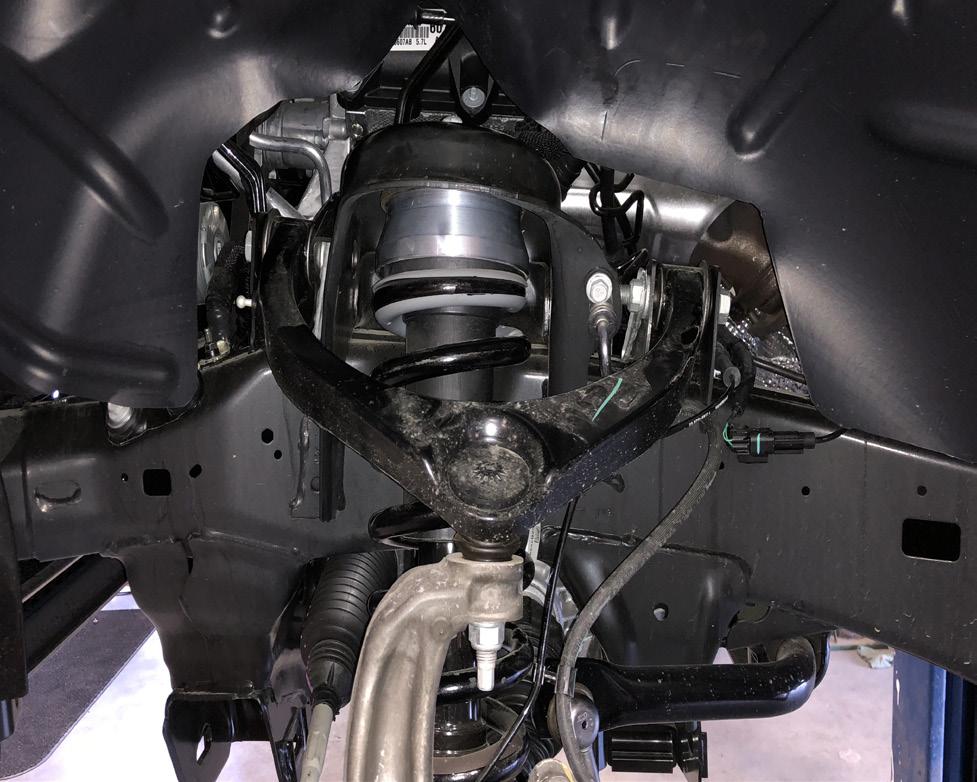 Move back to the lower strut mounting hardware and torque to 150 ft lbs. Congratulations, installation complete!