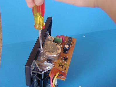 Holding the stepper motor rotor into its housing and slightly flexing the clear plastic frame will allow the motor shaft to clear the ring gear.