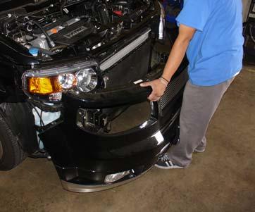 Replace the front bumper back to its original position and use the stock pins and screws to secure the bumper.
