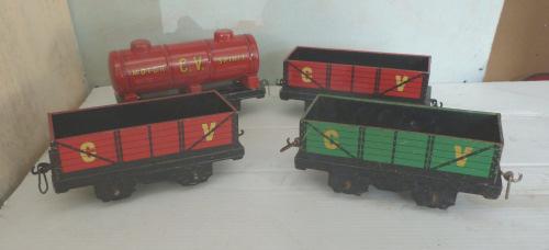 1.337P Other non-hornby 0-gauge - U.K. Chad Valley Pack Qty. 4 2-axle wagons, comprising 5-plank Open Wagon, red on black base with lemon lettering 'C.V.' (Qty.
