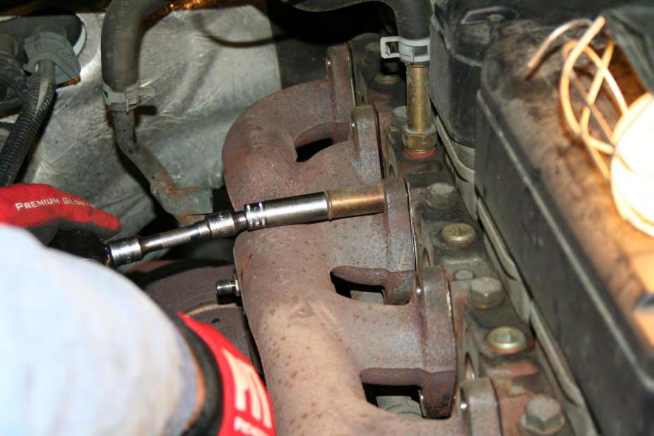 Remove the turbo/manifold assembly from the engine compartment.