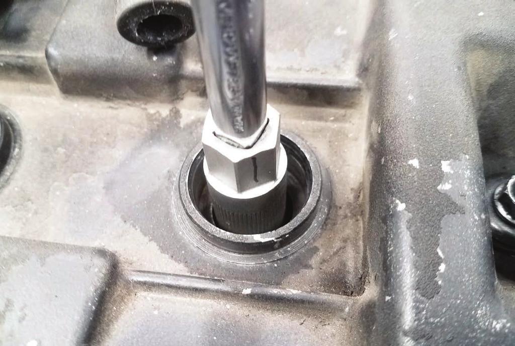 8. Misaligned Spark Plug >> Once this plug was tightened, we realized it was pointing in the wrong direction.