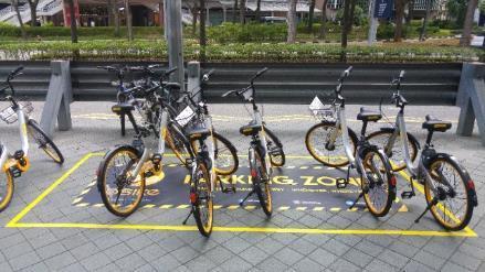 to seize opportunities Demarcated area for dockless bicycle parking outside Promenade MRT Open and