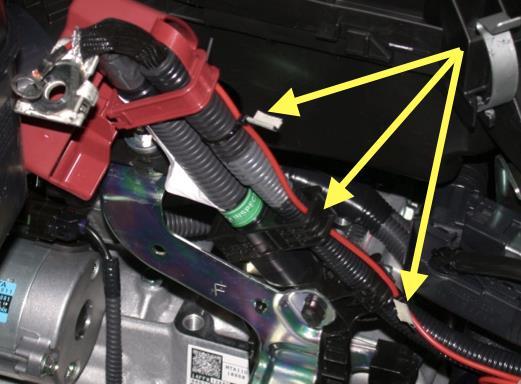 Connect the ring terminal from the relay (from Fog Light harness; 12v red wire) routing it through positive red terminal cover.