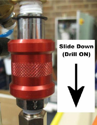 Place grounding clip on the drill bit and place the