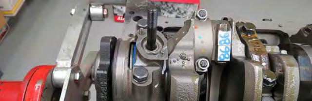bag #1. The timing pointer should be installed on the left side of the engine as shown below. Torque bolts to 5 ft-lbs.
