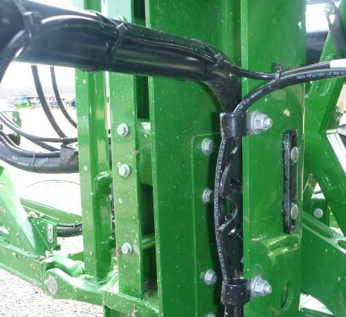 Run the sensor cable along the main lift bracket tube. Figure 11: Example Mounting of the Main Lift Bracket Avoid mounting the main lift sensor over or near a wheel-track.