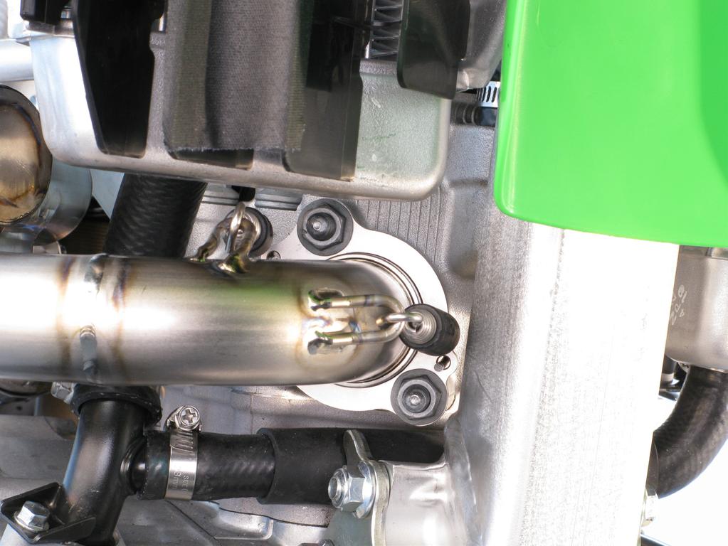 www.akrapovic.com 4. Insert the header tube into the sleeve, attach the springs and tighten the nuts to a specified torque (Figure 9).