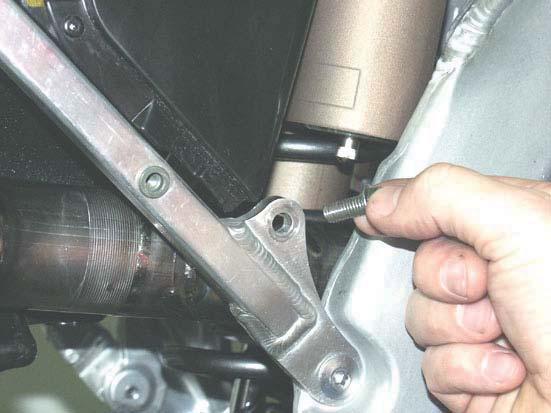 4. Install the aluminium collars and rubber dampers supplied in the Akrapovic kit on to the muffler clamp correctly.