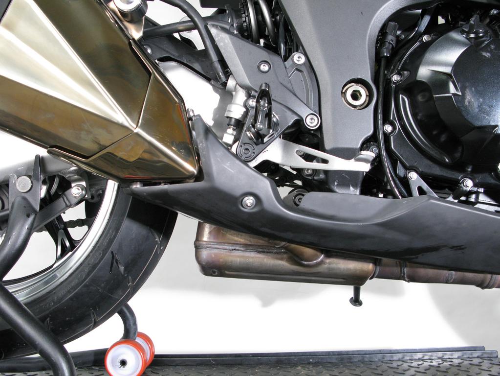 www.akrapovic.com REMOVAL OF STOCK EXHAUST SYSTEM: 1. Put the motorcycle on a side stand, we recommend a racing stand. Make sure, that surface is solid and flat. 2.