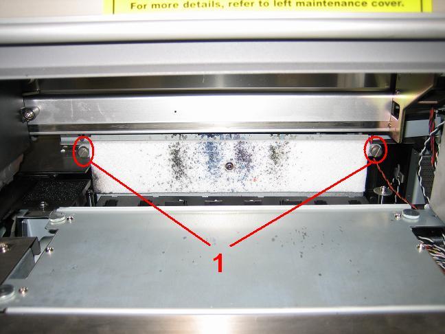 Note : a. Make sure that the 2 holes are on the right side of the flushing box and that the pins of the black box are in the holes of the absorbent.