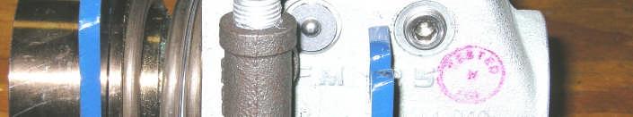 Hydrostat or a Bleed Valve, if installed in the wrong location, will interfere with the bracket during a disconnect.