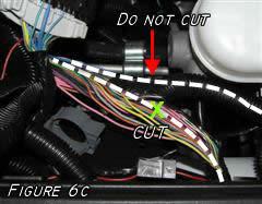 You want to tap onto the one that runs to the fuse block Remove the wire casing and carefully cut back the tape as shown in (figure 6A) In