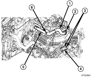 Fig. 70: Thermostat Assembly - 4.0L 2007 Dodge Nitro R/T Fig. 69: Identifying Thermostat 1. Clean old gasket material from cylinder head and thermostat housing. 2. Install thermostat housing with gasket and support bracket to cylinder head.