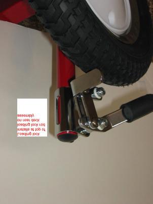 Top of loading lock should be flush with the top of tube. Take care that the lever is not touching the tire.