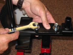 Install 9 1/16-inch bolt from bottom of bracket into square hole pointing up. (Figure 10.