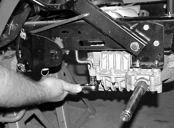 HXL Hydro Lawn Tractor Transaxle Installation 2000 and Prior 1. Raise the transaxle to the frame and install the 4 axle bolts, washers, and nuts (Figure 85). 3.
