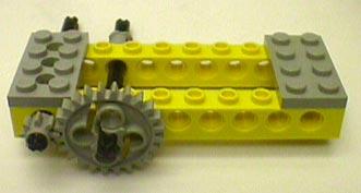 Building a Gear Train Use axles, beams, and gears to build a simple gear system using an 8-tooth gear and a 24-tooth gear.