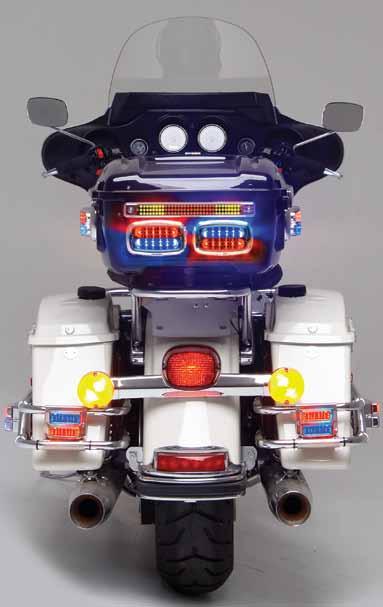 The rotating emergency light mounted on a bracket to fit on a motorcycle s front fender was presented to the police department by its inventor, George W. Whelen of the Whelen Engineering Company.