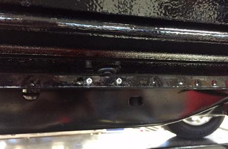 Figure 2 NOTE: Apply VPC approved sealant to all pinch weld holes before mounting brackets. 4.
