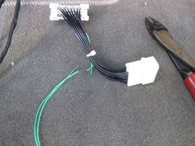Cut the 2 green wires from the OBD T Harness
